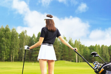 Young woman on golf course, back view