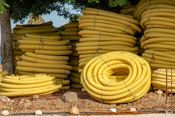 Coiled yellow plastic pipes
