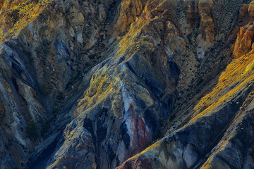 multicolored mountains, geological texture background, multicolor deposits of minerals, landscape