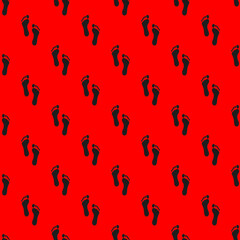 the trace of a man on a red background. black trail. seamless drawing of images of a human footprint on a red background. top view on the trail.3d rendering. 3d image.