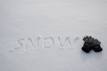 children's lettering on the snow of the winter season. cold, snowy season