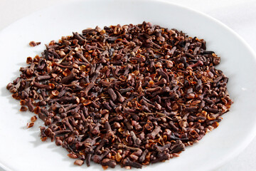 Dry flavored clove seeds. Used as a spice in cuisines all over the world.