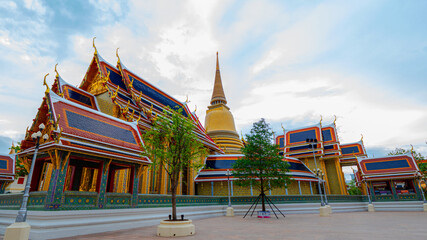 Beautiful landscape of Wat Ratchabophit Sathitmahasimaram Ratchaworawihan under blue sky and white...