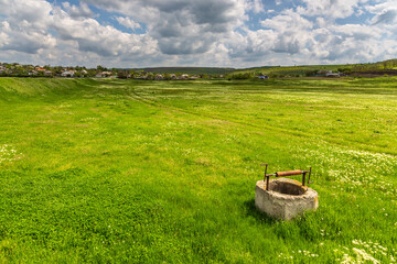 Old well casing on meadow. Iurievca, Gagauzja, Republic of Moldova.
