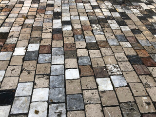Multicolored brown cobblestone street