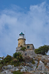 Fototapeta na wymiar lighthouse on the coast of the sea