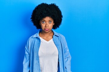 Young african american woman wearing casual clothes depressed and worry for distress, crying angry and afraid. sad expression.