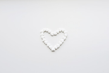 cardiomagnet heart pills and a glass of pure drinking non-carbonated water