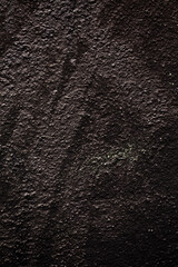 Textured black painted wall. Background for design.
