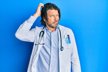 Middle age handsome man wearing doctor uniform and stethoscope confuse and wonder about question....