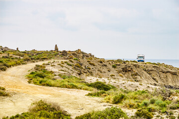 Fototapeta na wymiar Camper camp on cliff, coast in Spain