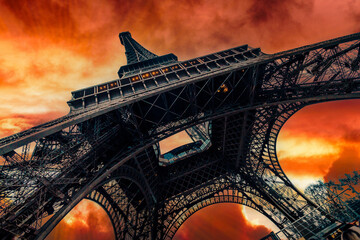 View of Eiffel Tower on sunset sky background