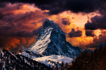 Matterhorn Mountain with clouds at sunset