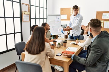 Group of business workers listening boss conference during meeting at the office.
