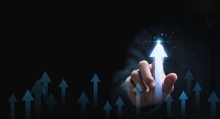 Businessman hand pointing to increasing arrow with percentage for business profit development...