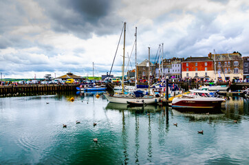 Fototapeta na wymiar Beautiful harbour in a cloudy day at Padstow, England, United Kingdom 