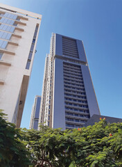Obraz premium View from below of modern building exterior. Skyscraper in Santa Cruz, Maintown on Tenerife.