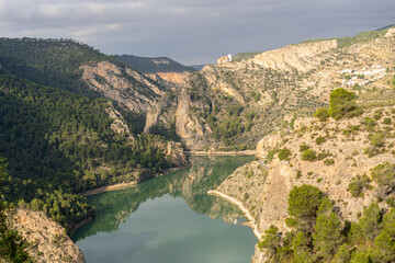 The El Molinar reservoir, in Castilla La Mancha (Spain) with the sanctuary of Cristo de la Vida in...