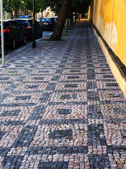 Fototapeta premium Long cobblestone sidewalk in Europe