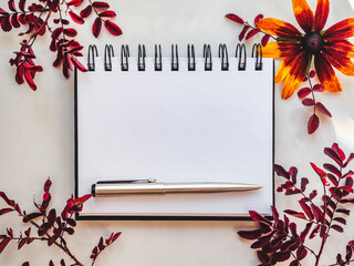 Notebook page and a place for your congratulatory message. Closeup, view from above, indoors. No...