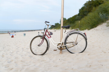 Fototapeta premium Bicycle on the beach of the Polish Baltic Sea near Kolobrzeg