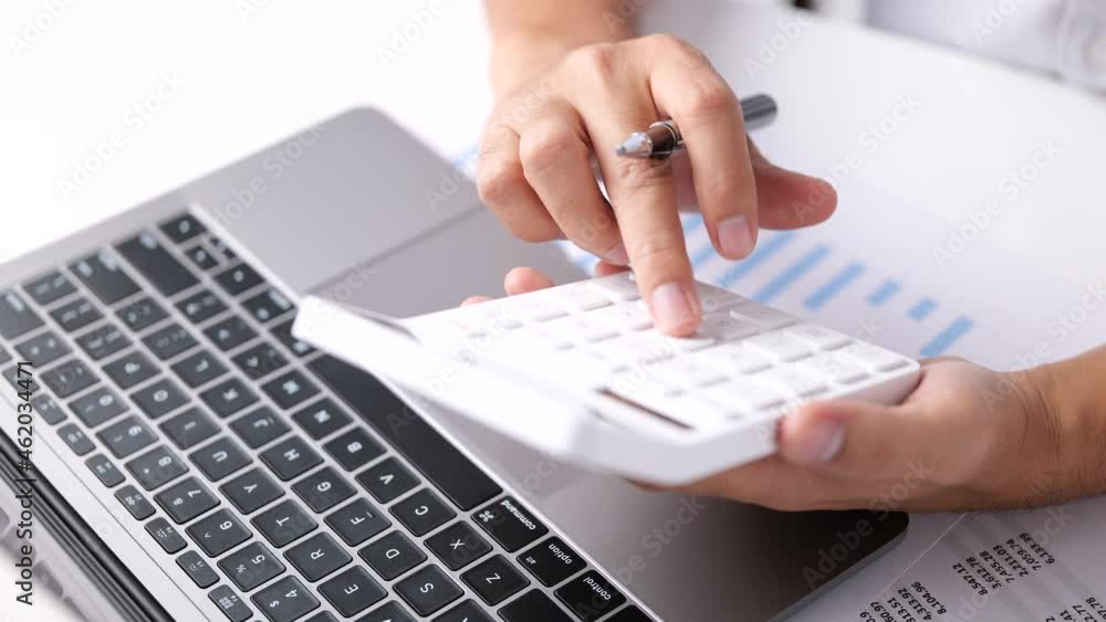 Poster accounting businessman working analyzing real estate investment data with laptop computer and calcul