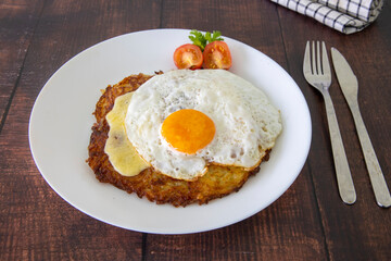 Berner Senne Roesti, Swiss potato cake with Appenzeller cheese topped with a fried egg