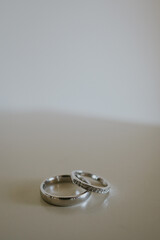 wedding rings on the table