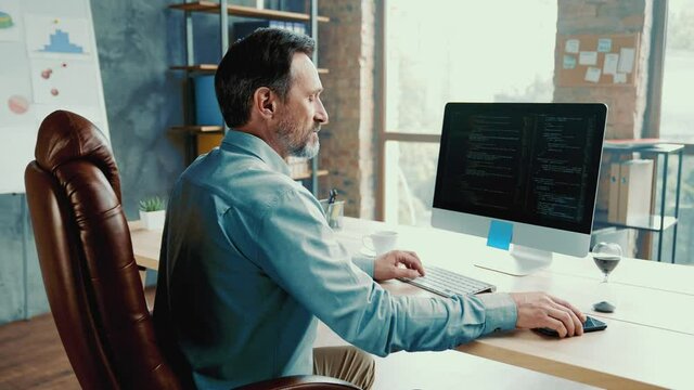 Confident analyst sit workplace consult client ask error bug