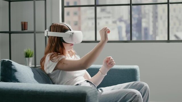 Girl closes and opens palm corrects virtual reality glasses