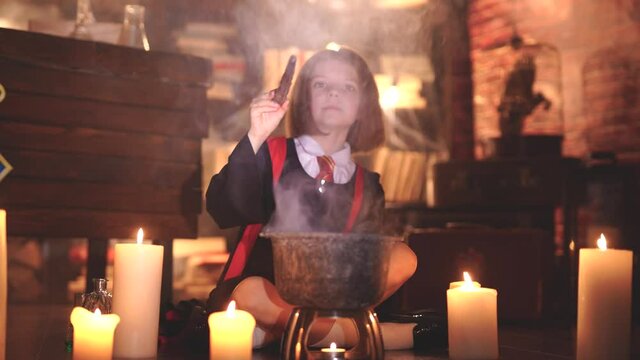 Little witch with cauldron - for Halloween. Harry Potter cosplay