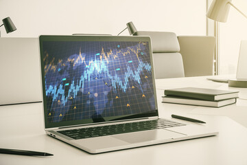 Modern computer monitor with abstract creative financial chart with world map, research and strategy concept. 3D Rendering