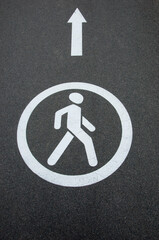 figure of a man on a gray background. road sign.illustration of career growth. driving direction concept