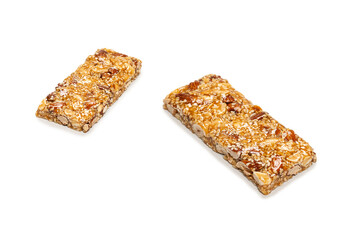Bar with mix of nuts isolated on a white background.