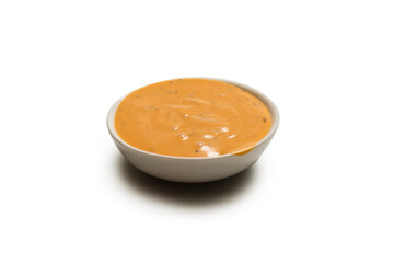 Sauce in a bowl isolated on white background.
