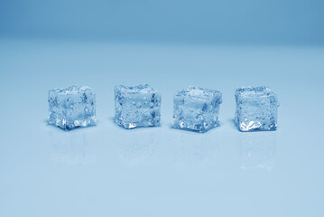 Obraz premium Ice crystal cubes, space for text or design.