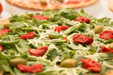 various food dishes, pizza, sphirra, snacks and various