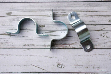Omega clamp, used to hold tubular articles, or to support, it is held with a pair of screws since...