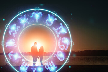 Horoscope concept, couple guy and girl on the background of a circle with the signs of the zodiac,...