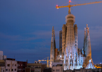 Night View of the Sagrada Familia Building at Night with mostly Clear skies