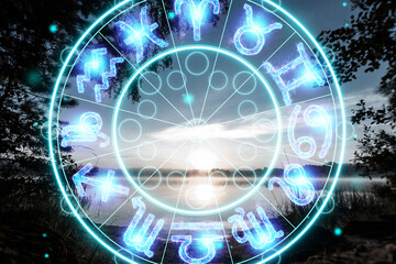 The concept of the horoscope, circle with the signs of the zodiac on a background of dawn, astrology. Consulting with the stars.
