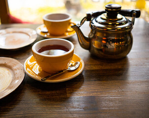 Tea set on the wooden table