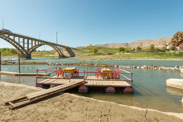 Floating dining room of a restaurant on the waters of the Tigris river in Turkey