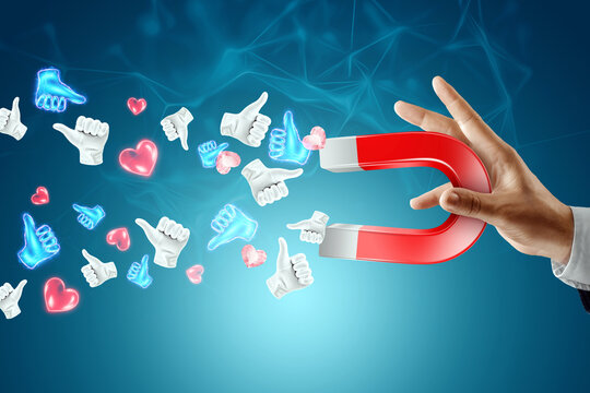 Successful social media advertising strategy. A man attracts a lot of likes with a magnet. The concept of creative marketing, popularity, many subscribers.