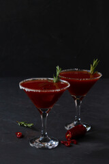 cocktail on black.Bloody Mary cocktail. Alcoholic drink with vodka and tomato juice in a glass isolated on a black background. vampiro cocktail with pepper on a busy bar top. copy space. vertical