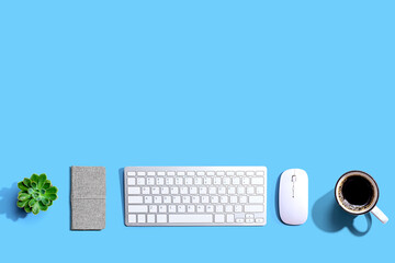 Computer keyboard and mouse from above - overhead view