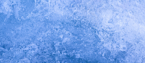 Blue ice banner background in winter. Abstract texture