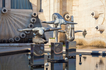 Fototapeta na wymiar Sculptures of divers and sports gymnasts in a fountain of Yerevan Cascade. Yerevan city, Armenia.