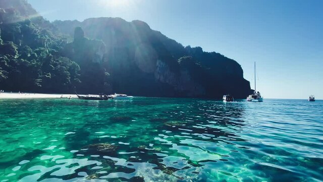 Thailand coast as seen from a moving boat, Surin Islands on a beautiful sunny day