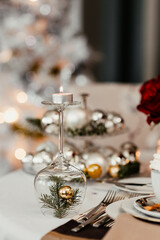 White flowers on a table with porcelain tableware